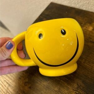 Yellow smiley face mug